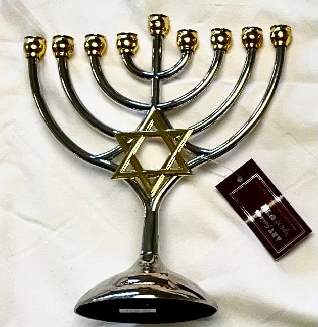 Silver Menorah with gold Star of David on a white background