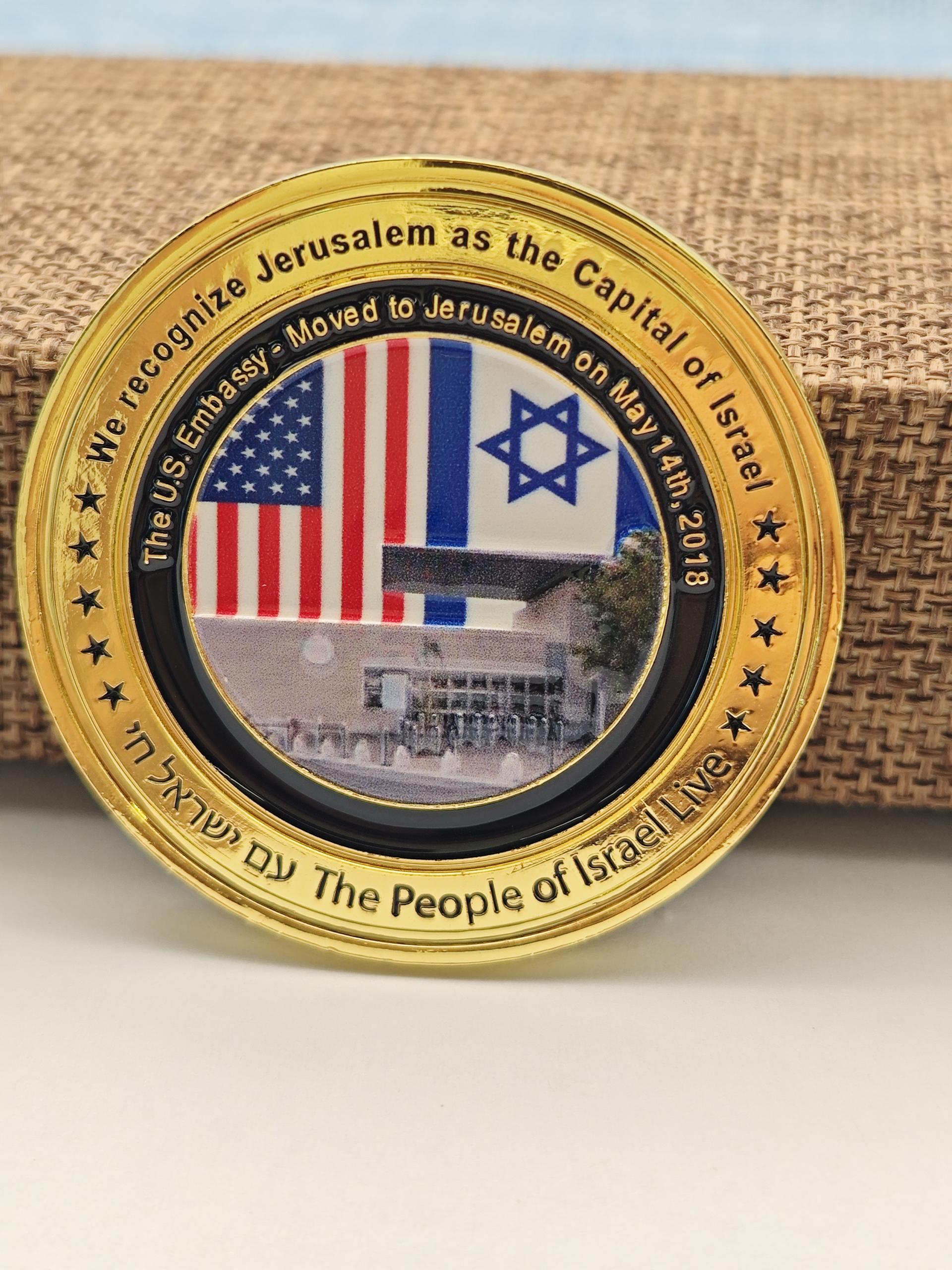 Coin commemorating the U.S. recognition of Jerusalem as Israel's capital, featuring American and Israeli flags.