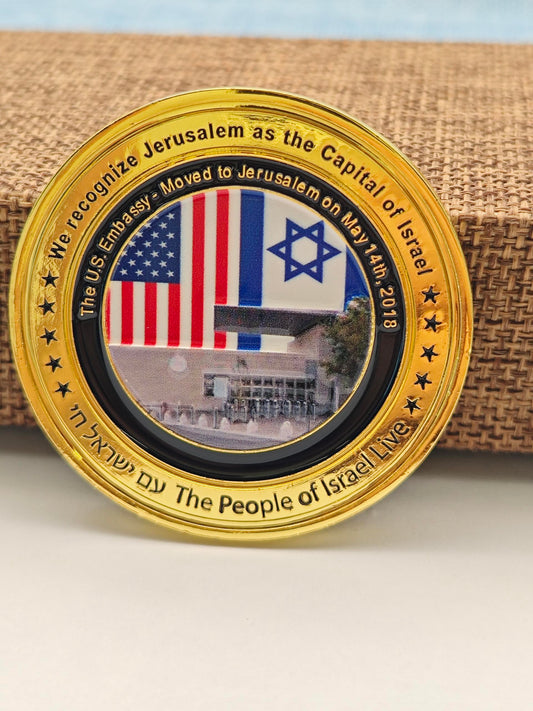 Coin commemorating the U.S. recognition of Jerusalem as Israel's capital, featuring American and Israeli flags.
